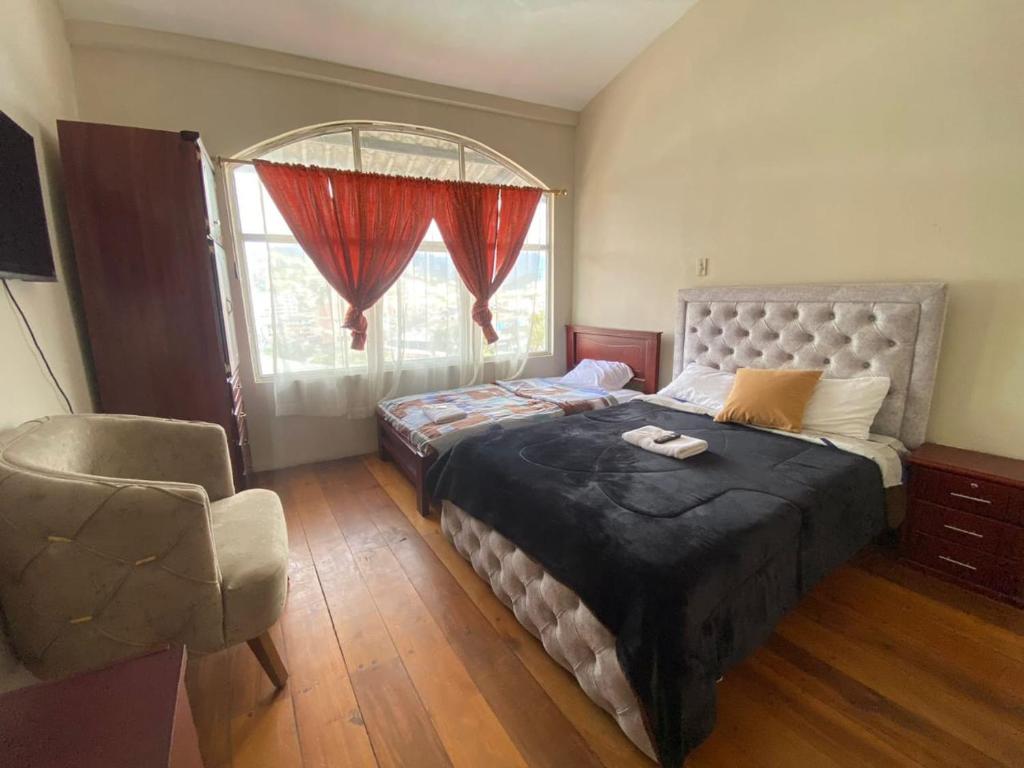 Ένα ή περισσότερα κρεβάτια σε δωμάτιο στο Home Austro loja