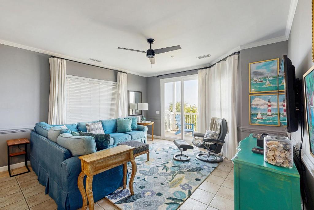 Et opholdsområde på Seaside Condo 101
