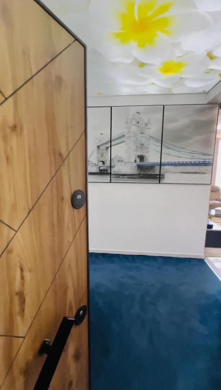 a door in a room with a ship on the ceiling at executive 3-bedroom in Nyali