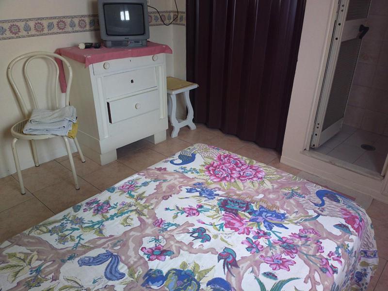 Postel nebo postele na pokoji v ubytování Hotel Delhy