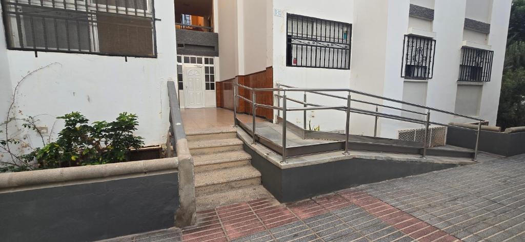 a set of stairs leading up to a building at Rooms Plaza hierro in San Bartolomé de Tirajana