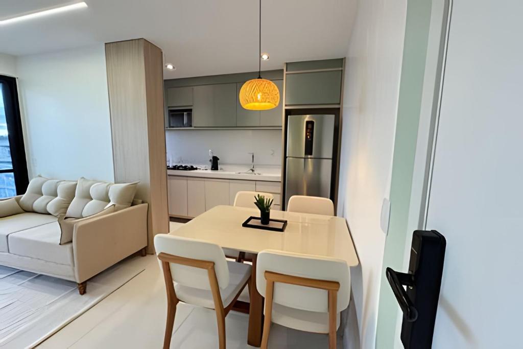 Η κουζίνα ή μικρή κουζίνα στο Apartamento Novo e Decorado com Vista Incrível