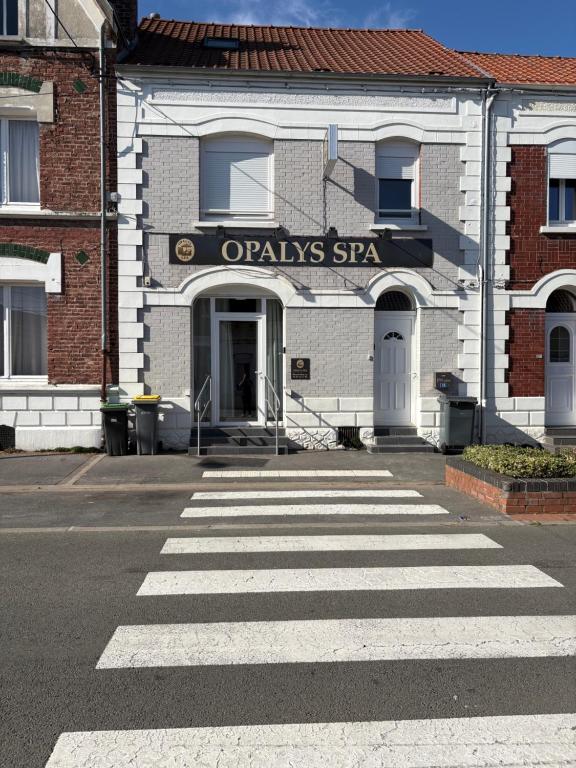 an empty street in front of a building at Opalys spa 