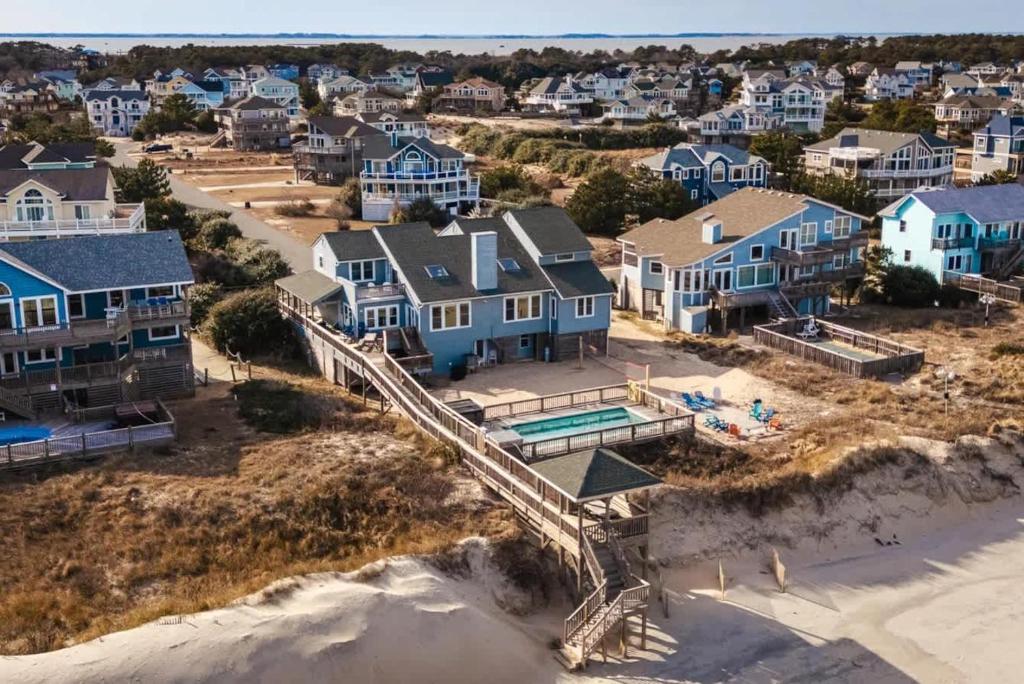 an aerial view of a homes on the beach at Oceanfront Pool & Spa Volleyball Court Game Rm in Corolla