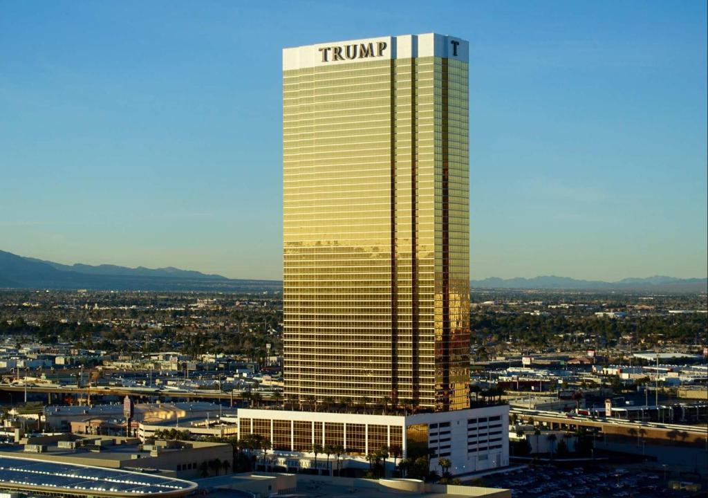 a tall building with a trump hotel on top of it at Trump Deluxe Studio Mountain View in Las Vegas