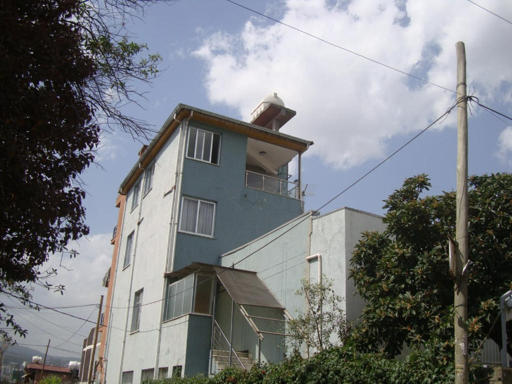 a blue and white building with at Sapphire View in Dirē Kʼalu