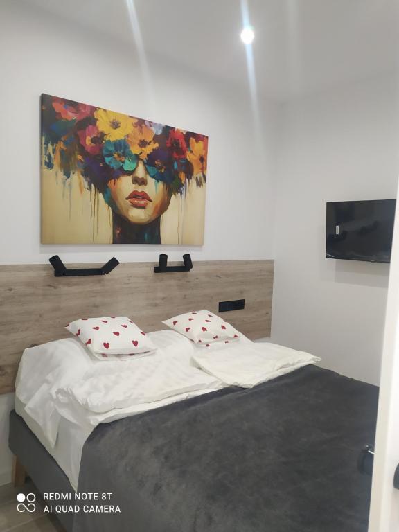 Ένα ή περισσότερα κρεβάτια σε δωμάτιο στο Loft 210
