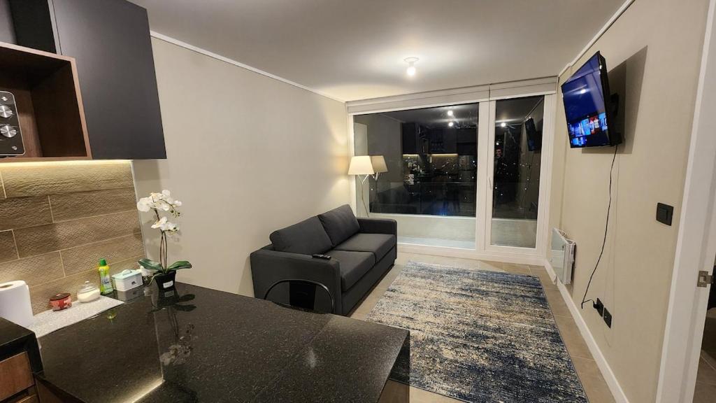 โทรทัศน์และ/หรือระบบความบันเทิงของ Departamento moderno, nuevo, 1D1B, inmejorable ubicación, estacionamiento