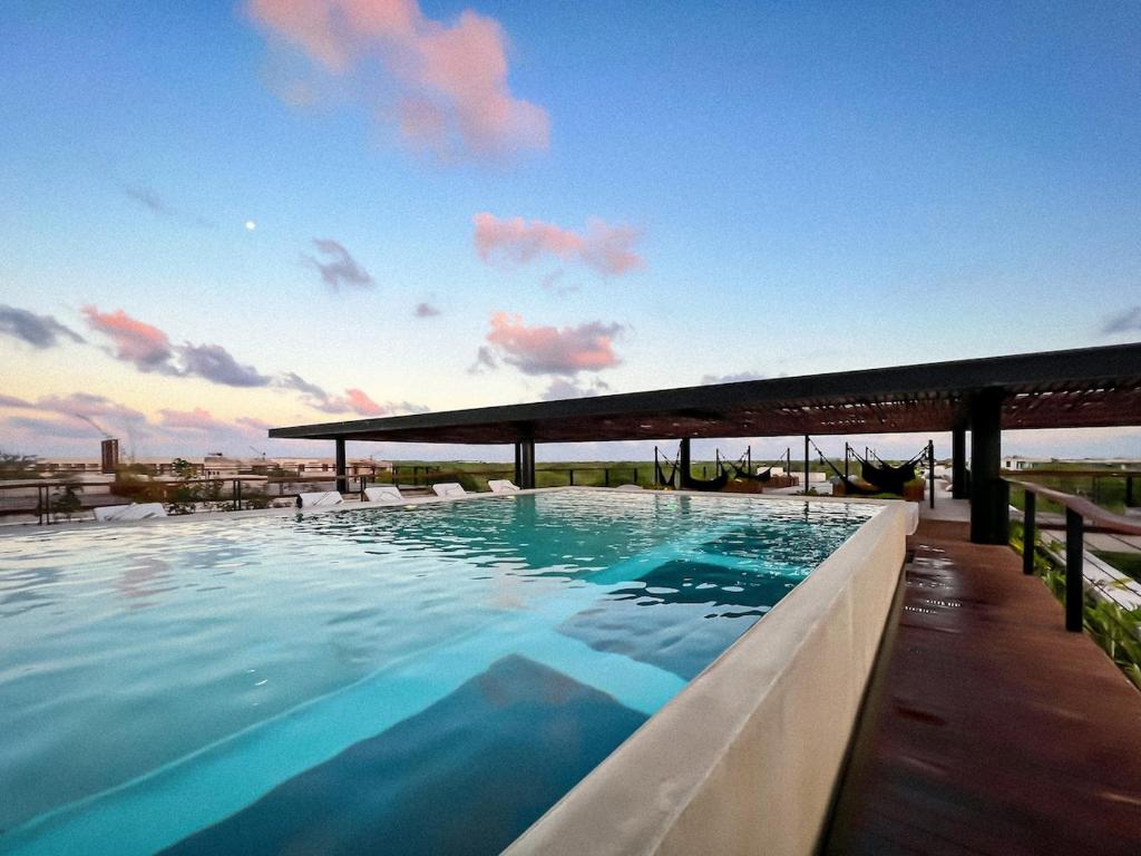 View of Gated 2BR apartment with rooftop pool, Tulum (updated prices 2026)