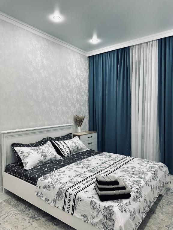 Кровать или кровати в номере Sweet home