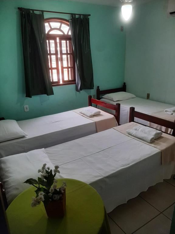 Ένα ή περισσότερα κρεβάτια σε δωμάτιο στο Quarto Praia das Dunas Braga