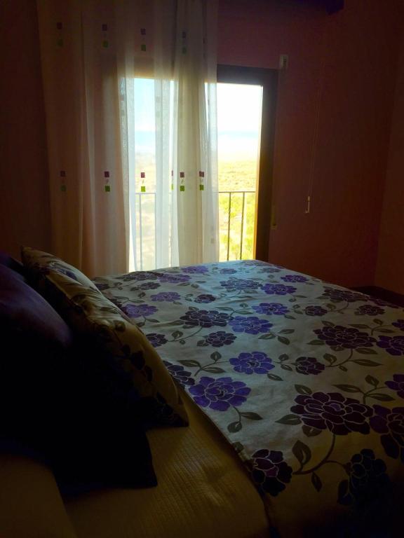 Cama o camas de una habitación en Casa Nostra Matarranya