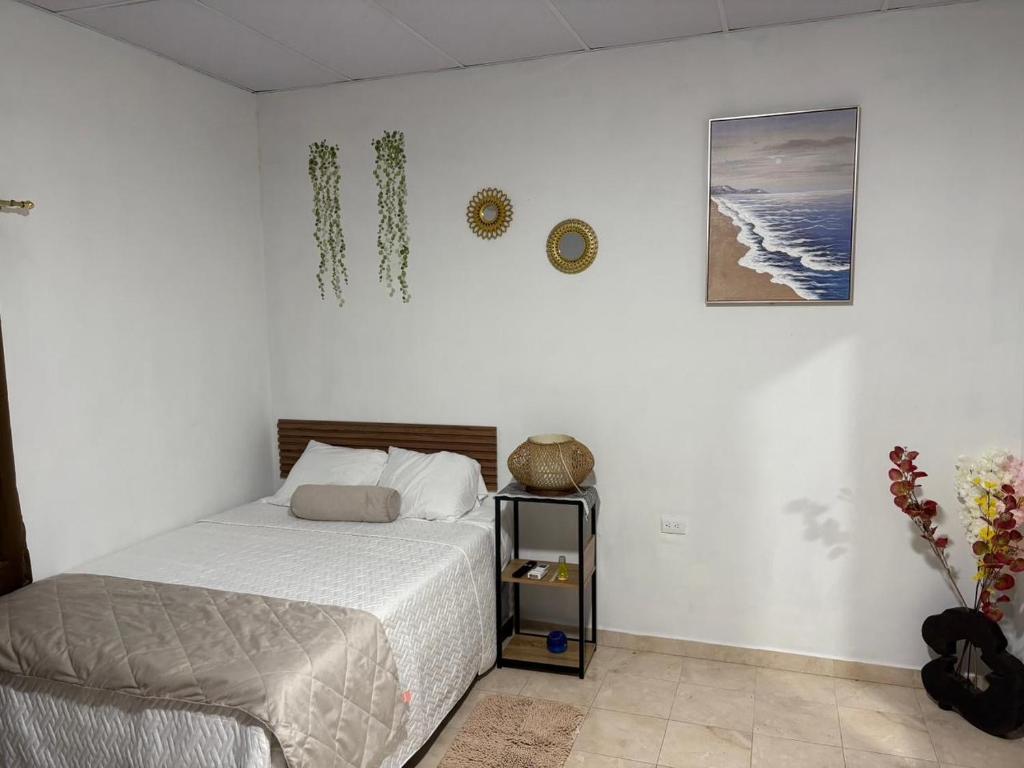 Ένα ή περισσότερα κρεβάτια σε δωμάτιο στο La ceibasurf