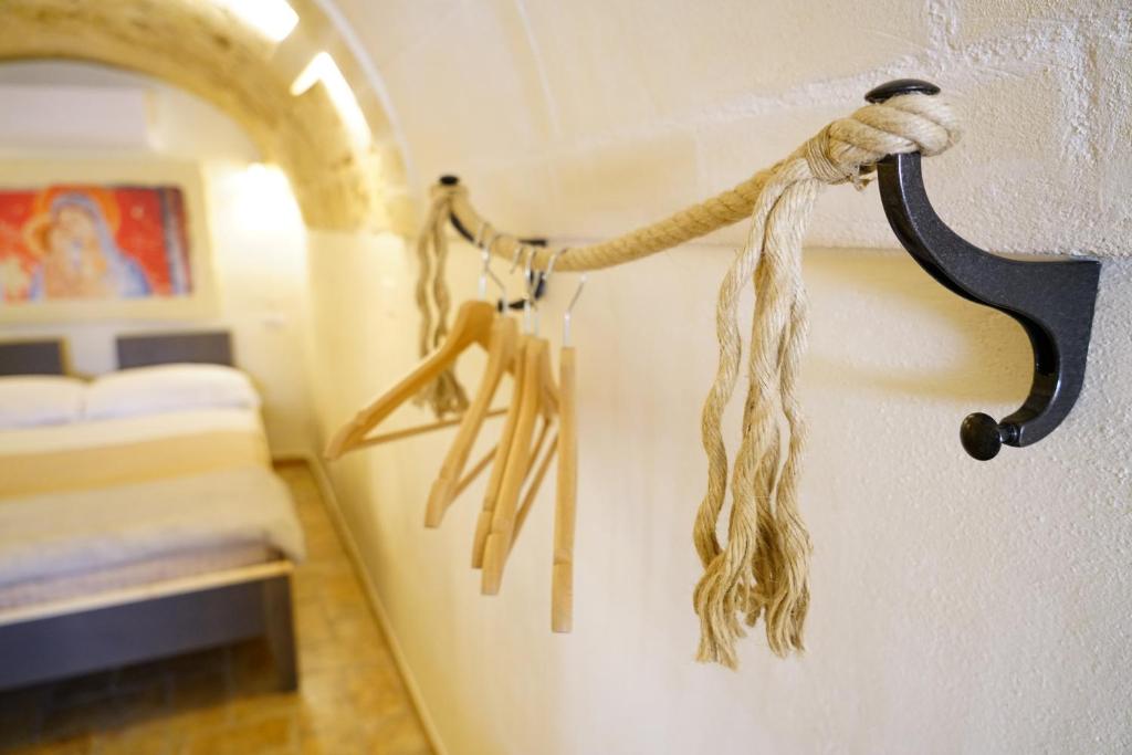 Postel nebo postele na pokoji v ubytování La Pergola ai Sassi