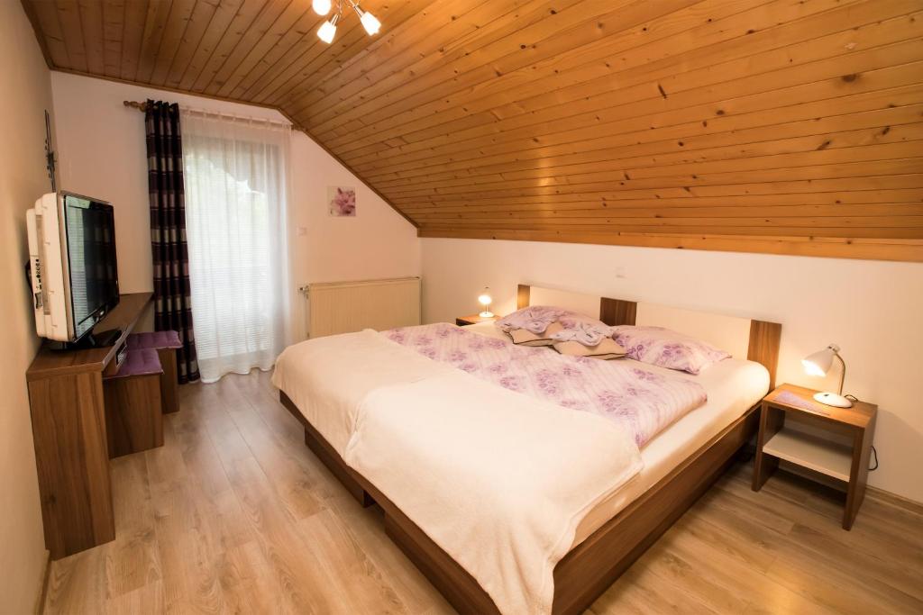Postel nebo postele na pokoji v ubytování Accommodation Resman