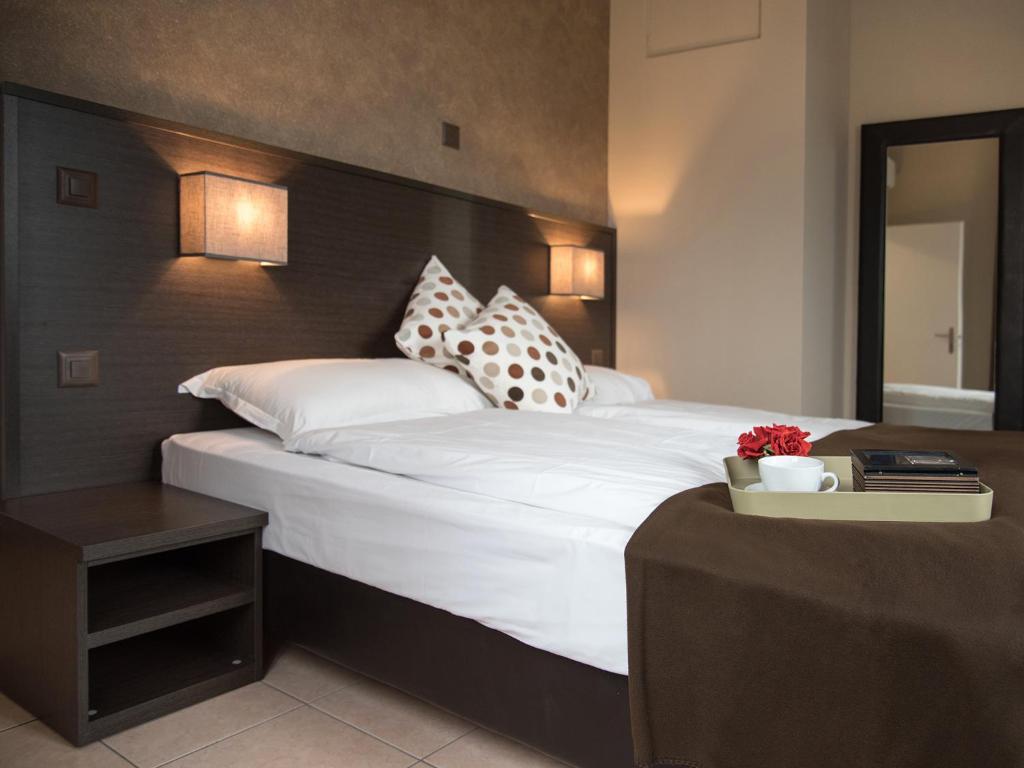 Letto o letti in una camera di Locanda Del Conventino