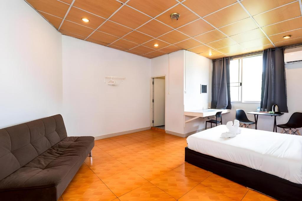 Ένα ή περισσότερα κρεβάτια σε δωμάτιο στο At Gate Suvarnabhumi-สุขุมวิท 77 X2