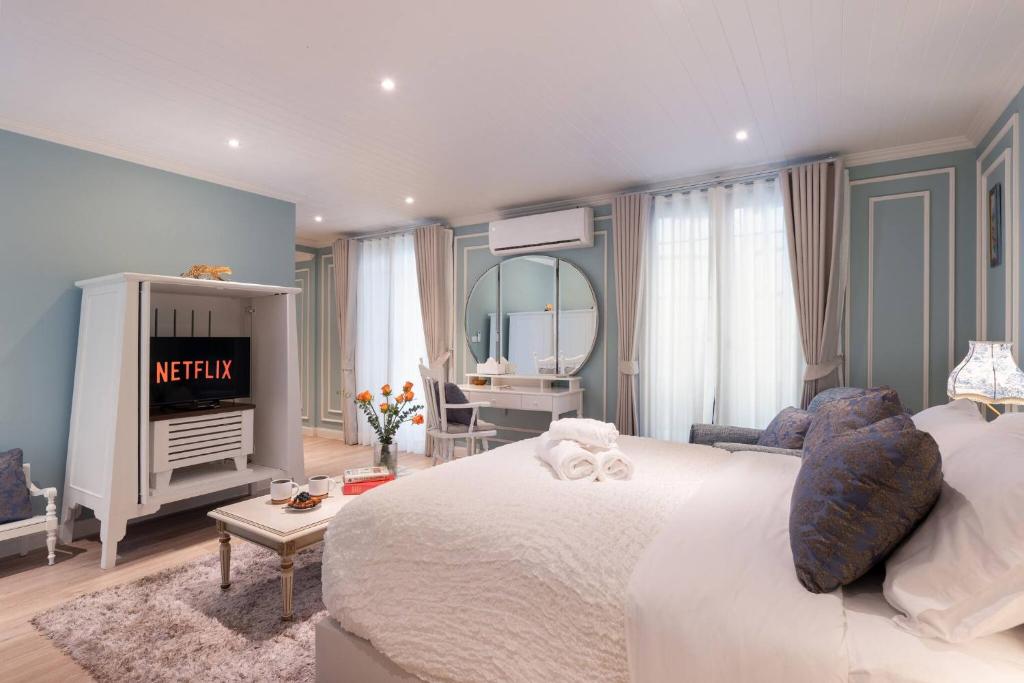 Ένα ή περισσότερα κρεβάτια σε δωμάτιο στο Chic 1BR |5 min BTS, 2 min to spa|500Mbps&bath-tub