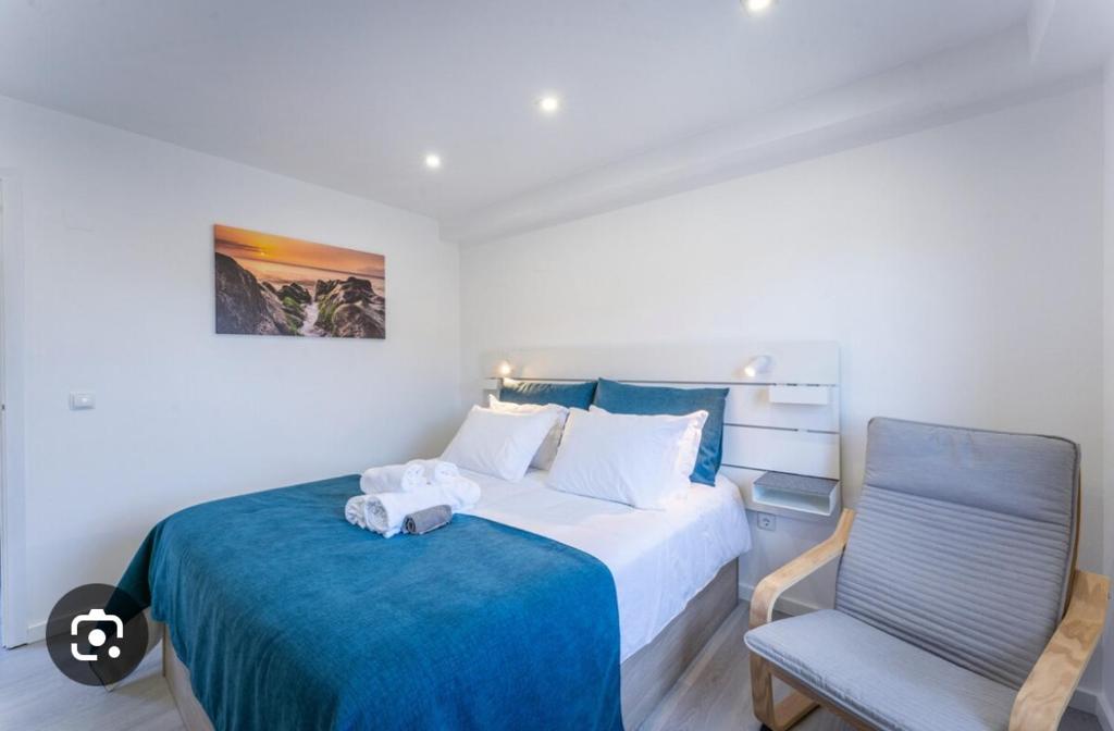 Ένα ή περισσότερα κρεβάτια σε δωμάτιο στο Homestay Cascais