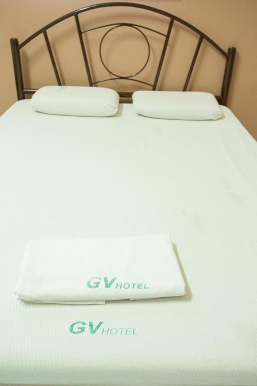 Postel nebo postele na pokoji v ubytování GV Hotel - Masbate