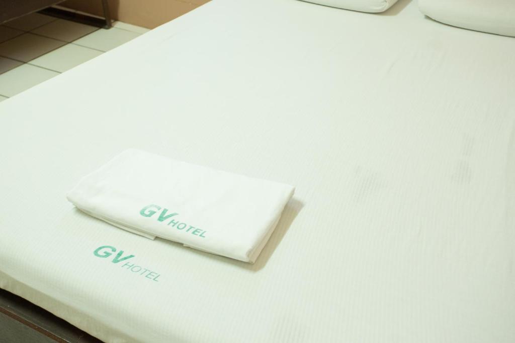 Postel nebo postele na pokoji v ubytování GV Hotel - Masbate