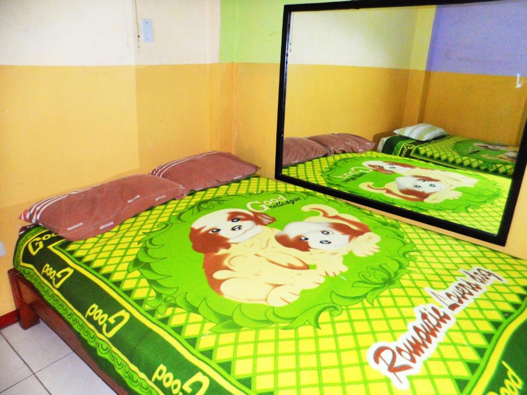 Postel nebo postele na pokoji v ubytování Hostal Jovita