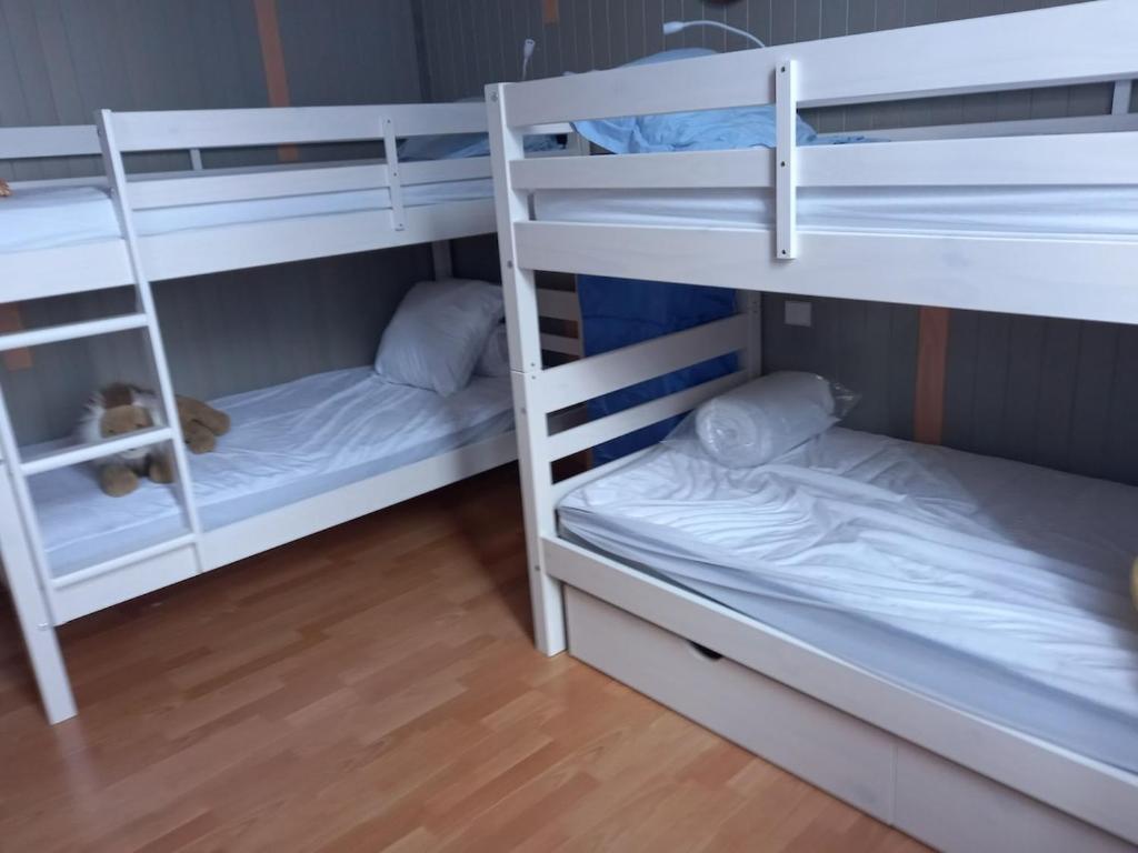 Postel nebo postele na pokoji v ubytování Belle Arcachonnaise Rêve Bleu