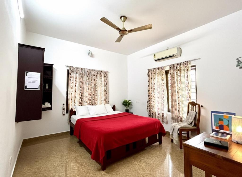 Ένα ή περισσότερα κρεβάτια σε δωμάτιο στο Maya Residency