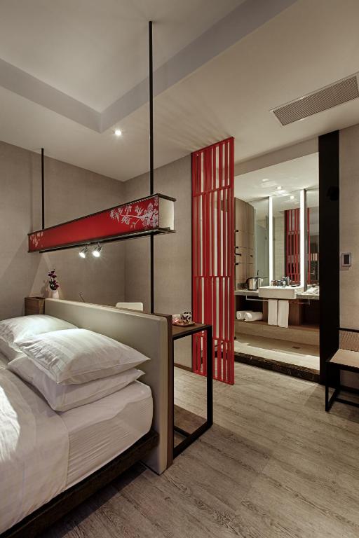 Postel nebo postele na pokoji v ubytování City Place Hotel