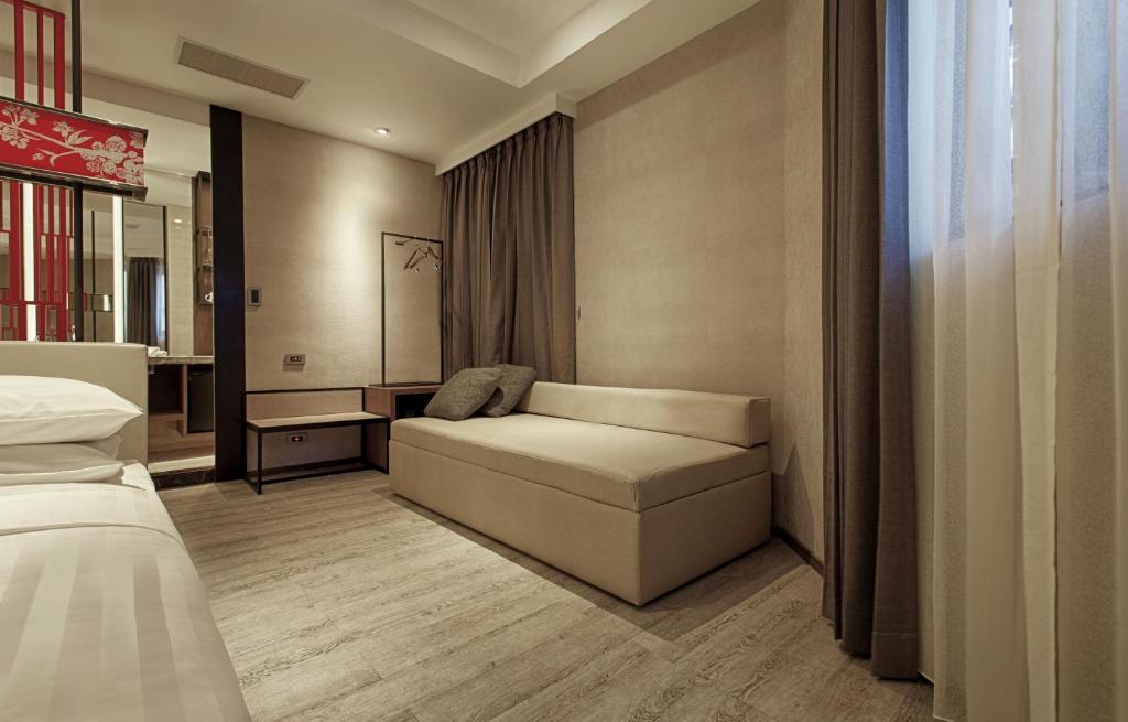 Postel nebo postele na pokoji v ubytování City Place Hotel