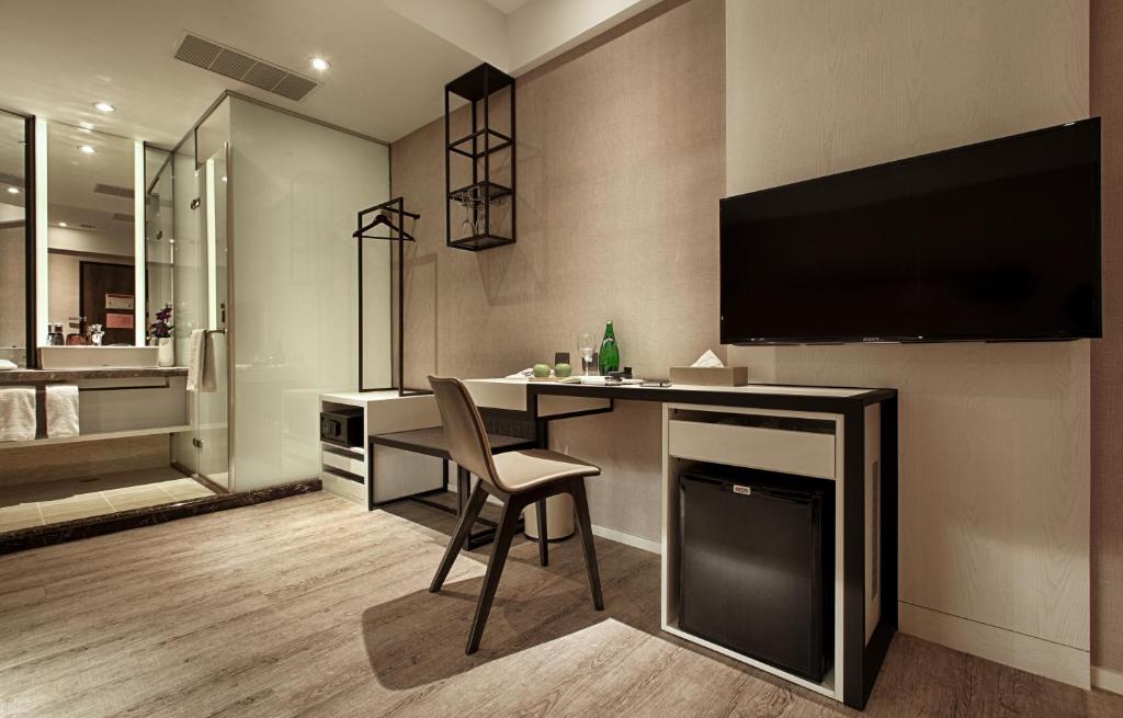 TV a/nebo společenská místnost v ubytování City Place Hotel