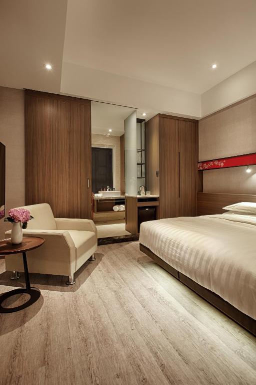 Postel nebo postele na pokoji v ubytování City Place Hotel