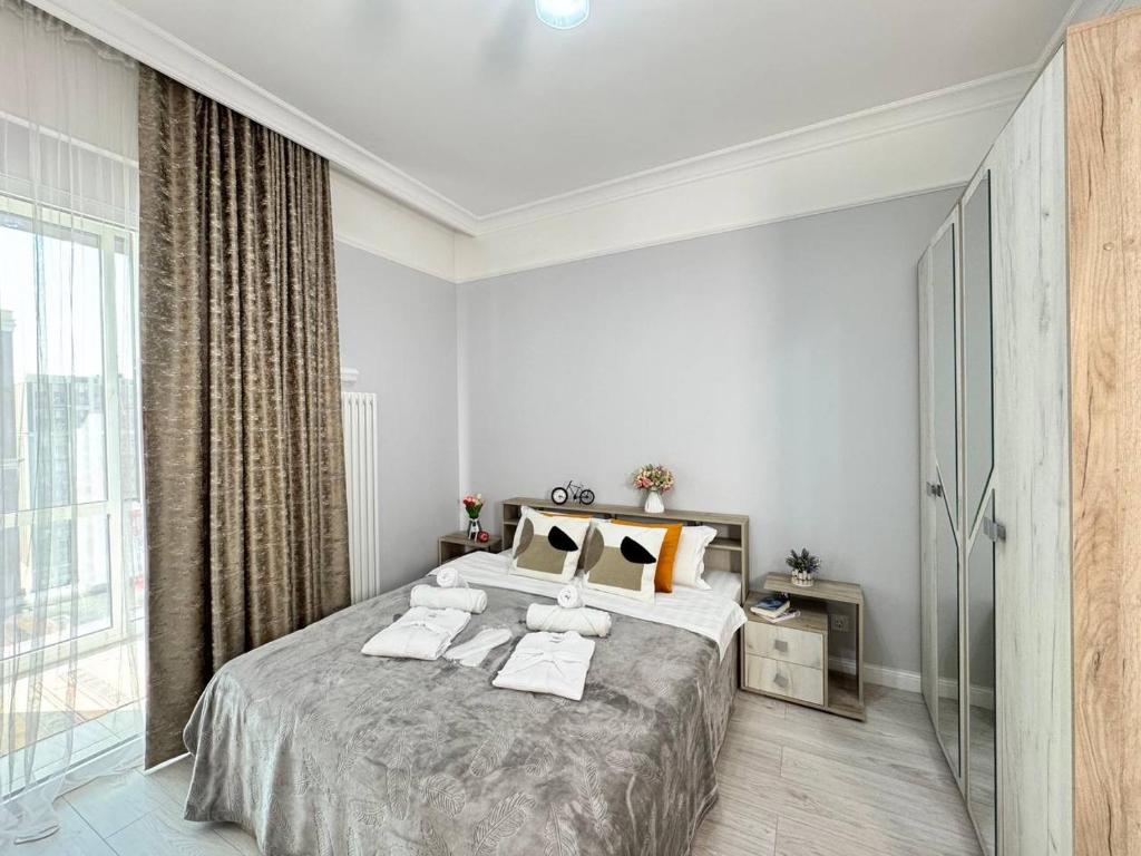 Ένα ή περισσότερα κρεβάτια σε δωμάτιο στο 2 room apartment near MEGA, ЖК 4 YOU, flat 163