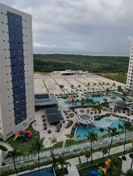 an aerial view of a resort with a swimming pool at Esclusive Resort Salinas in Salinópolis