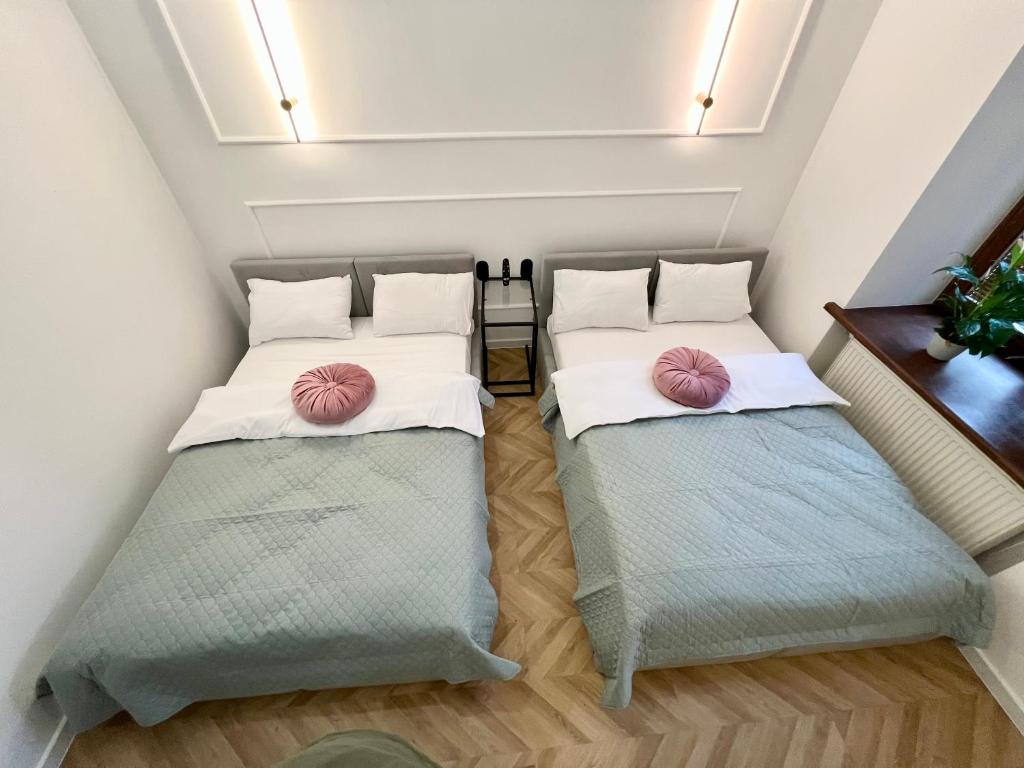 Ένα ή περισσότερα κρεβάτια σε δωμάτιο στο Stacja Łódź Piotrkowska 82 Apartament No3