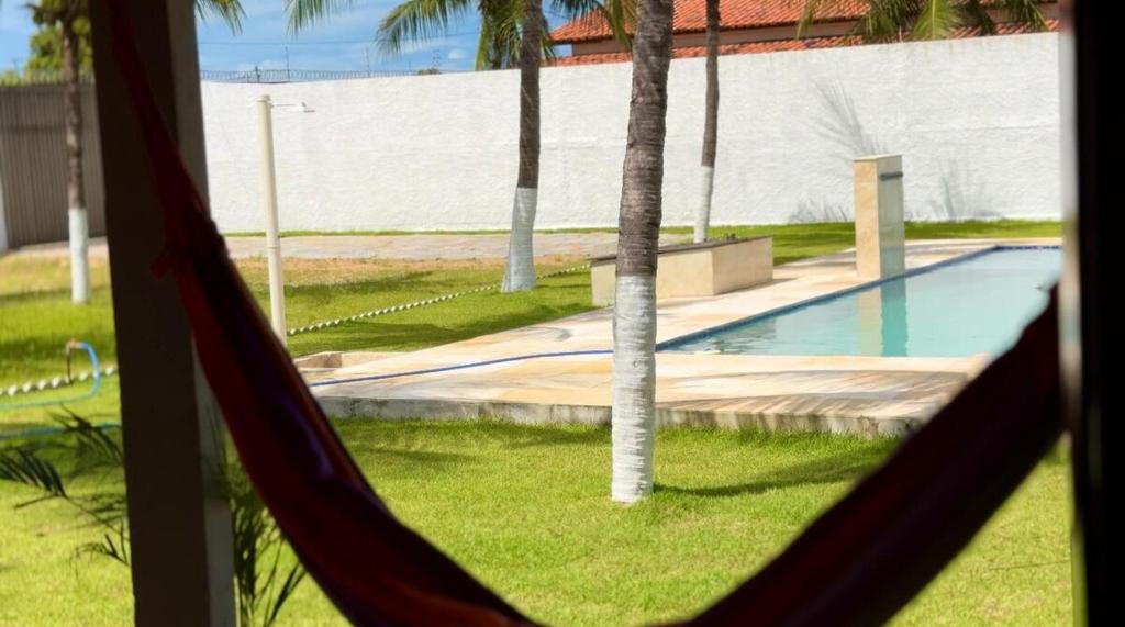 Kolam renang di atau dekat dengan Recanto do Aconchego