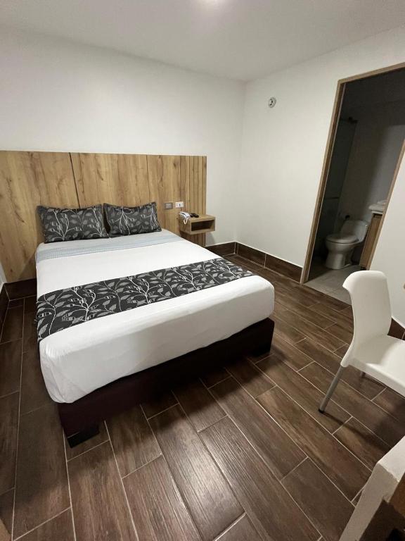 Postel nebo postele na pokoji v ubytování Aw Hotel Ariston Embassy