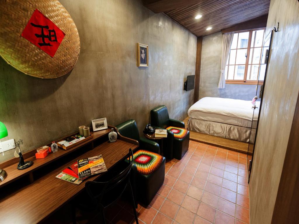 Postel nebo postele na pokoji v ubytování Jian Shan Hotel