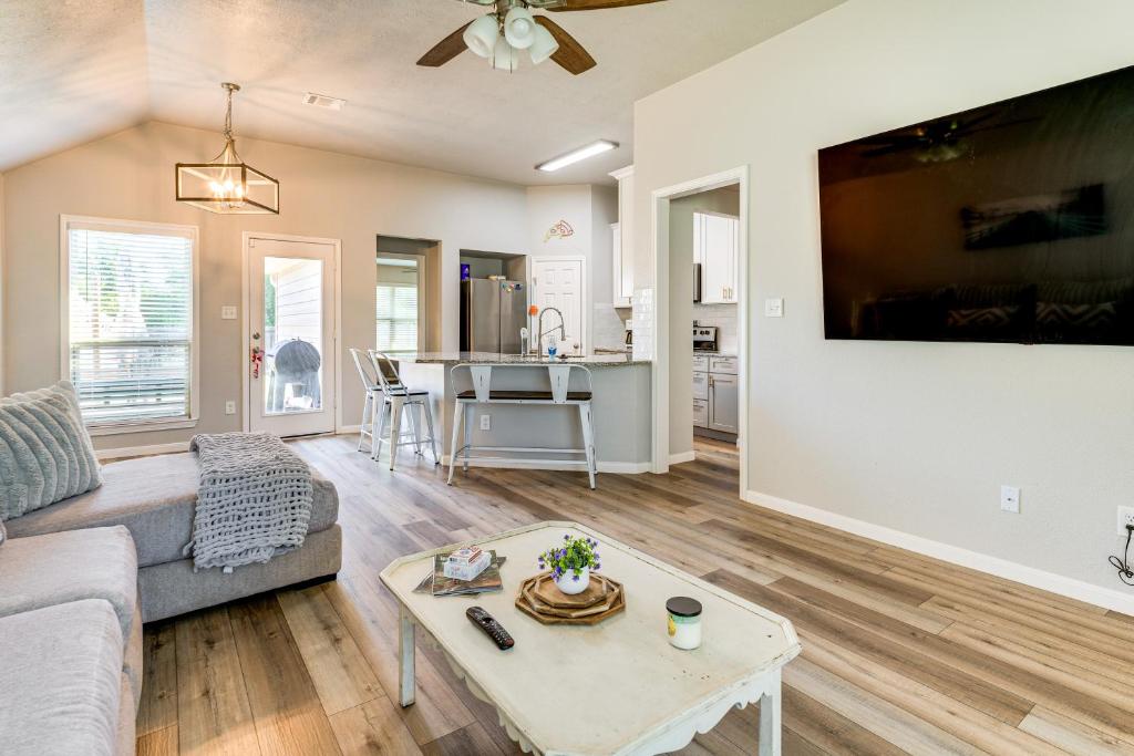 a living room with a couch and a table at 9 Mi to College Station Dog-Friendly Home with Yard in Bryan