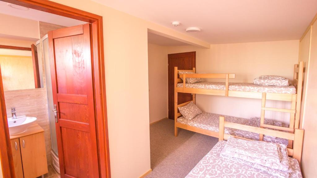 Postel nebo postele na pokoji v ubytování Green House Hostel