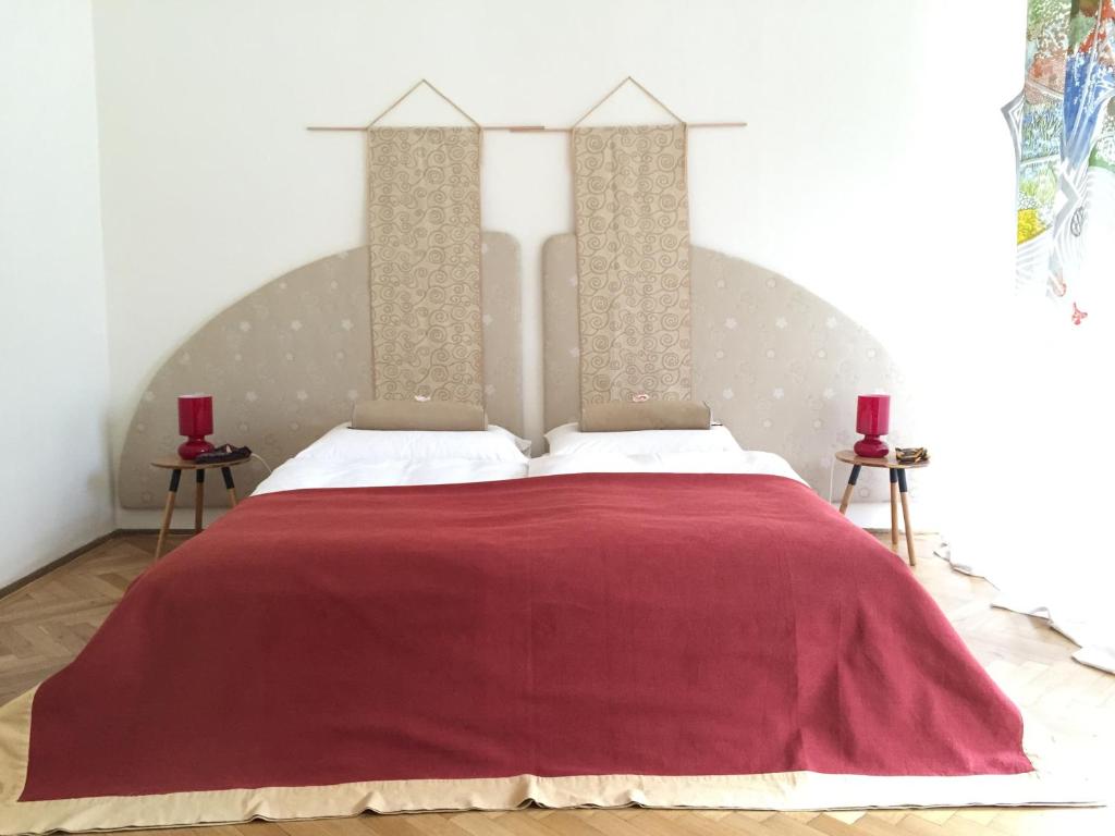 Voodi või voodid majutusasutuse Wohnzimmer toas