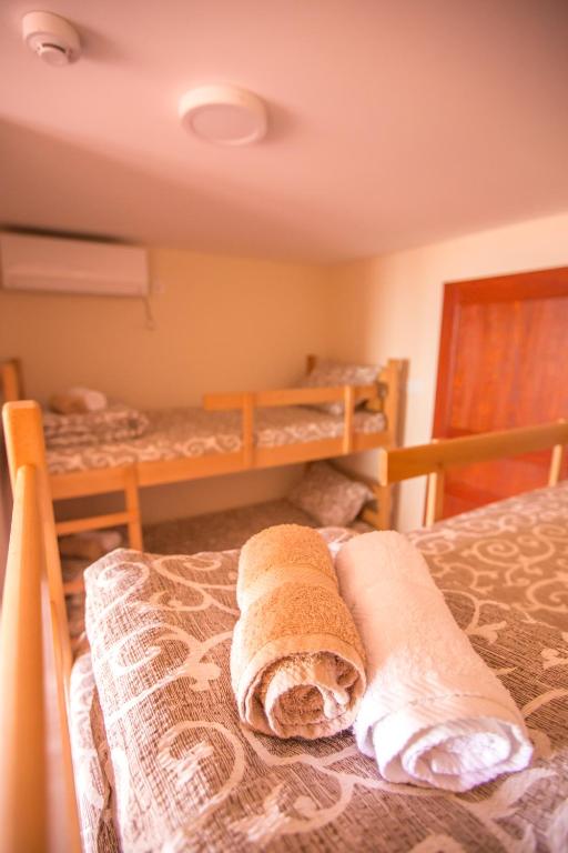Postel nebo postele na pokoji v ubytování Green House Hostel