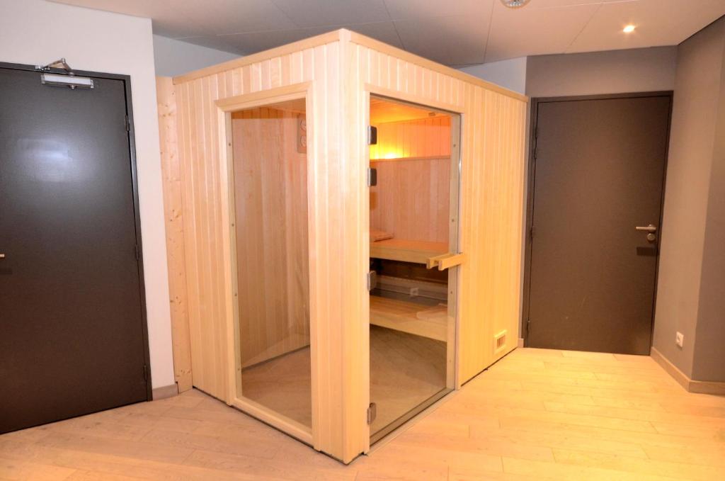 Postel nebo postele na pokoji v ubytování Green hotels Confort Paris 13