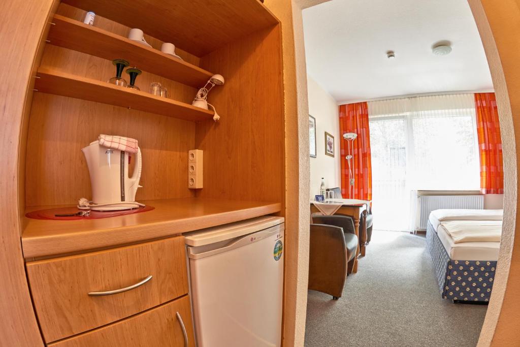 Kuchyň nebo kuchyňský kout v ubytování Hotel-Pension Elfi