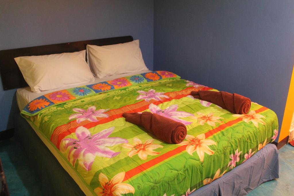 Postel nebo postele na pokoji v ubytování Rc Guest House
