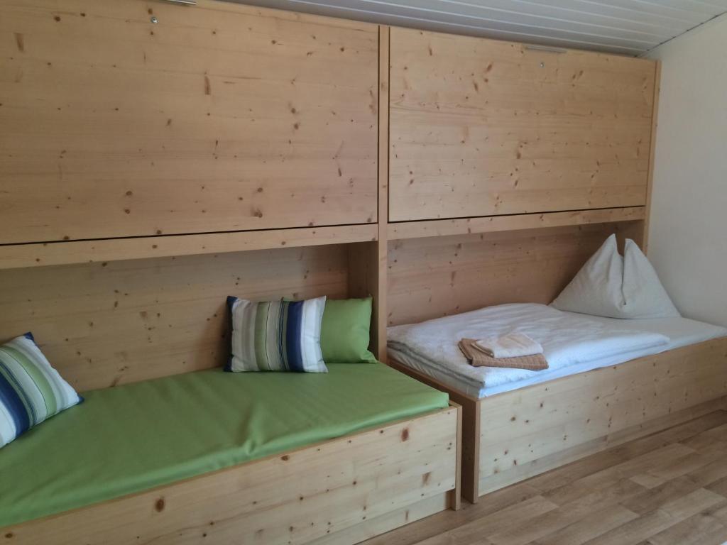 Postel nebo postele na pokoji v ubytování Gasthof Tennenblick