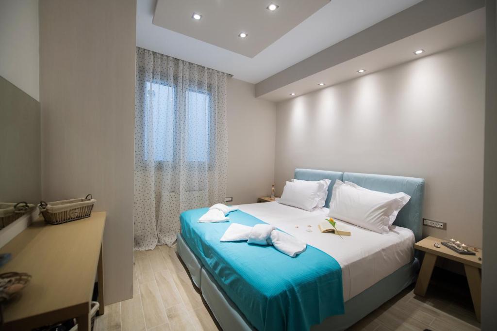 Postel nebo postele na pokoji v ubytování Lefkas Villas