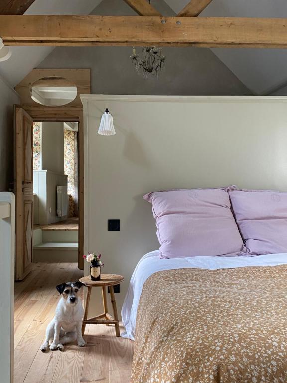 Postel nebo postele na pokoji v ubytování Cottage normand - charme et authenticité