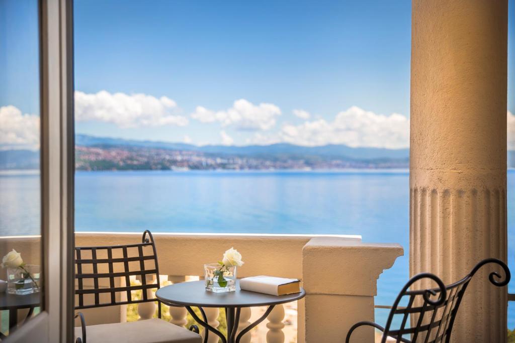 a balcony with a view of the water at Hotel Palace Bellevue - Liburnia in Opatija