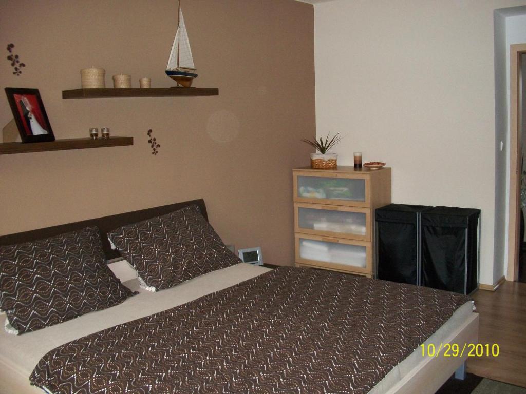 Postel nebo postele na pokoji v ubytování Hotel Kovarna